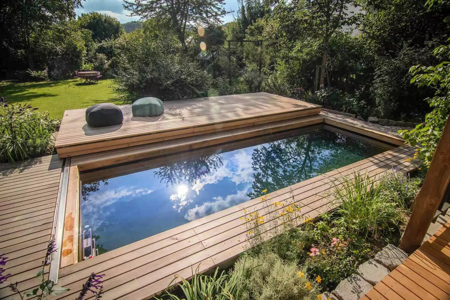 A wonderful garden with a Holc natural pool. The natural pool made of wood.